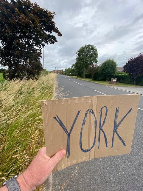 enterprising entrepreneur hitchhiking